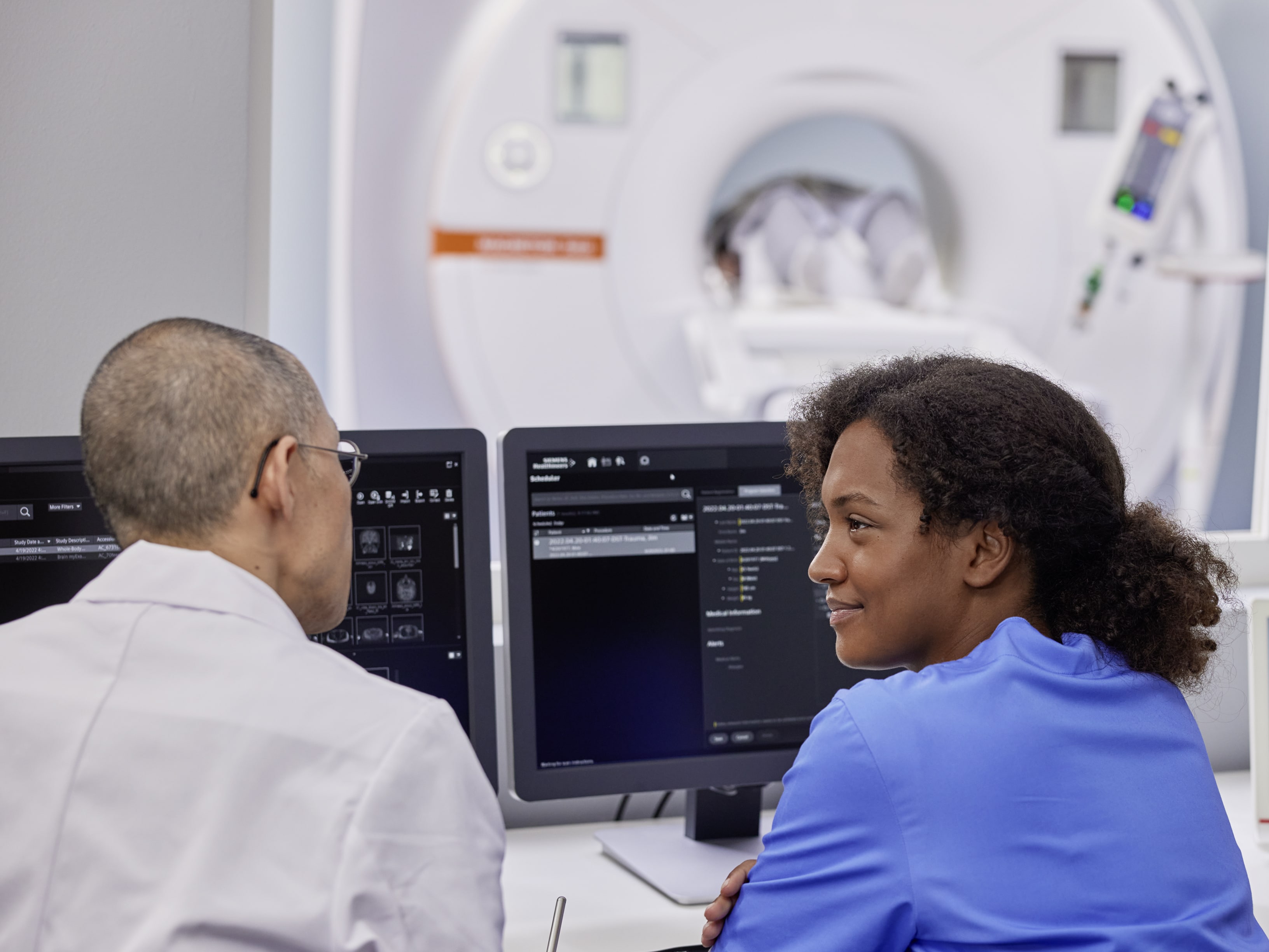 Image showing two radiologists engaged in a discussion